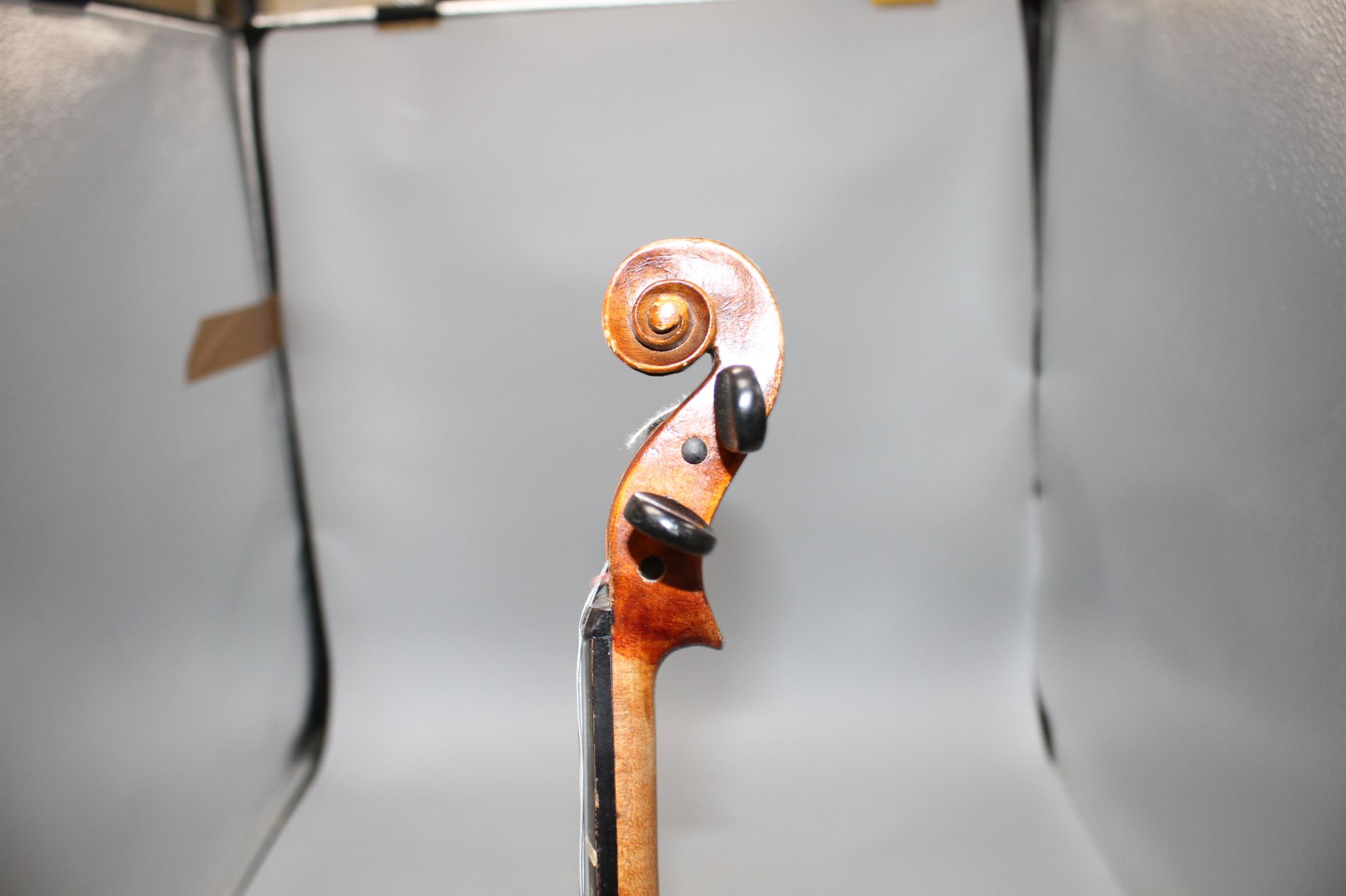 A violin with two piece back and bow, and a child's violin with bow, both with cases Condition:- - Image 19 of 44