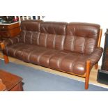 A mid century Danish Ekornes teak and leather Amigo three seater sofa, W.210cm D.88cm H.88cm