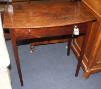 A late George III mahogany bowfront side table, with single drawer on squared legs, W.76cm D.45cm