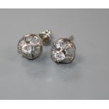 A pair of modern 18ct white gold and diamond cluster earstuds, with central raised claw set round