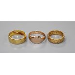 Two 22ct gold wedding bands and a 9ct gold signet ring, 9ct 2.5 grams, 22ct 11 grams.