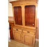 A Victorian pine bookcase, W.130cm D.50cm H.220cm Condition: The timber is faded throughout, there