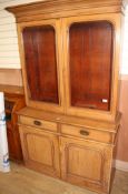 A Victorian pine bookcase, W.130cm D.50cm H.220cm Condition: The timber is faded throughout, there