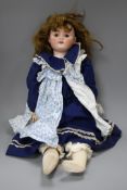 A Kestner 168 bisque head doll, marked E.168.9 Condition: Face a little dirty but otherwise head