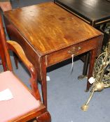 A George III strung mahogany butterfly wing mahogany table, with frieze drawers and squared