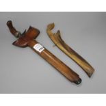 A Kris with hardwood handle and scabbard and another similar with horn scabbard Condition:- Kris -
