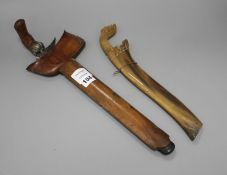 A Kris with hardwood handle and scabbard and another similar with horn scabbard Condition:- Kris -