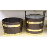 Two brass bound wooden tubs, diameter 33cm and 31cm Condition: - the taller of the two is oak and
