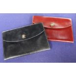 Two Hermes leather clutch purses, one in black, the other burgundy, 24 x 16.5cm, with one Hermes