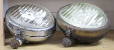 Two vintage Notek 'Fog Master' motoring lamps, height of bezel 20cm, width 23cm Condition: One