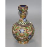 A Chinese champleve enamelled gilt brass vase, decorated with flowers, height 23cm Condition: One or