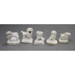 Five Staffordshire porcelain toy figures of poodles, c.1835-50, all with typical minor manufacturing