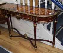 A pair of Meuble Francais marquetry inlaid console tables, W.130cm D.39cm H.80cm Condition: Very