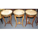 A near set of three Meuble Francais marble topped occasional tables, Diam.40cm H.67cm Condition: