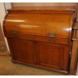 A late Victorian oak cylinder bureau, W.120cm D.56cm H.112cm Condition: A new piece of timber has
