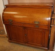 A late Victorian oak cylinder bureau, W.120cm D.56cm H.112cm Condition: A new piece of timber has