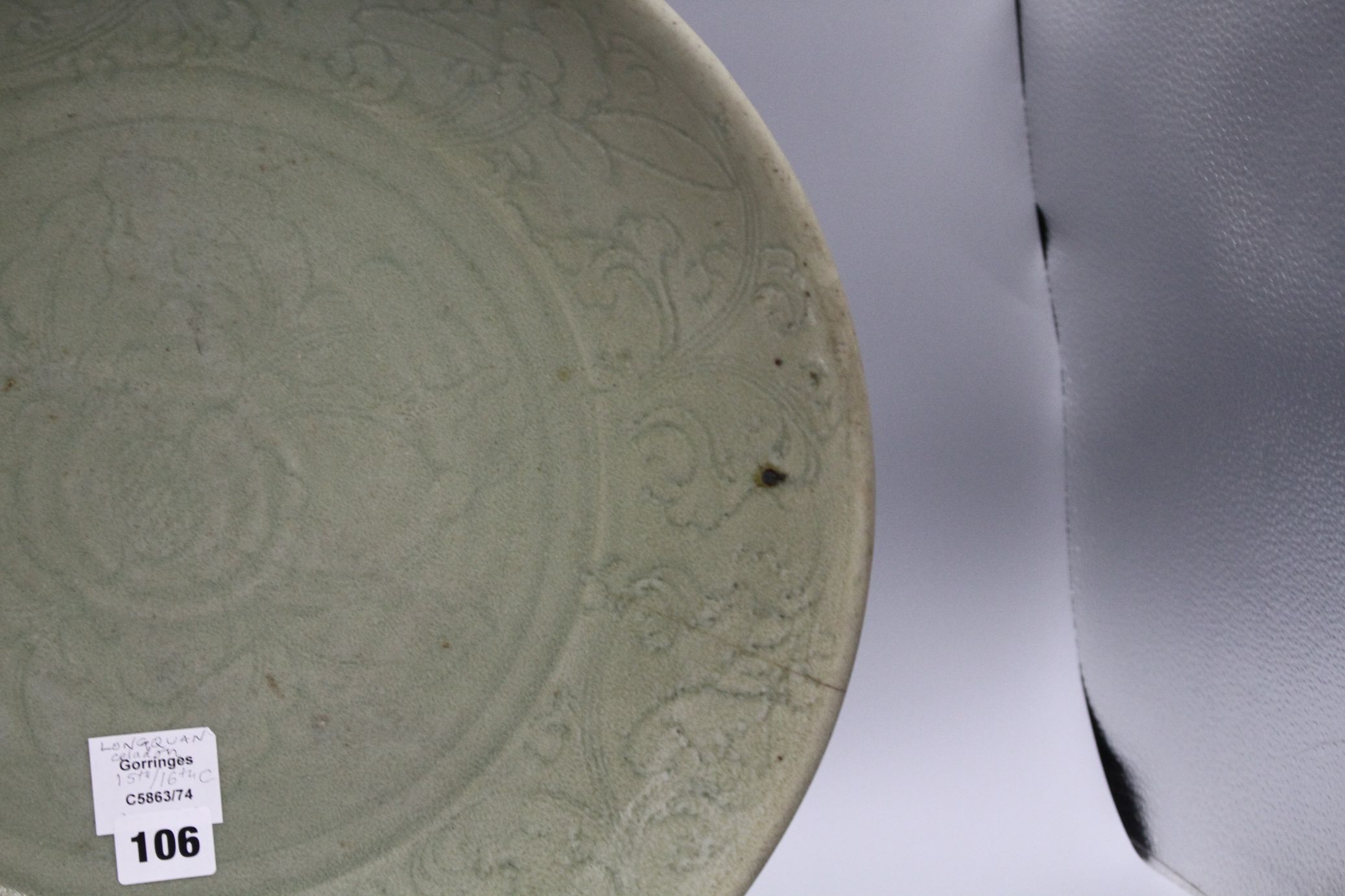 A 15th / 16th century Longquan celadon dish, incised with flowers, diameter 43cm, height 8.5cm - Image 9 of 12