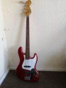 A Squier J-Bass Affinity series guitar Condition: Electrics are all working, damage to body work,