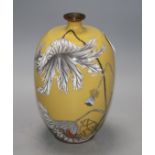 A Japanese Meiji period cloisonne vase, decorated with a crab and fading foliage against a beige