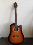 An EKO electro acoustic guitar, with hard case Condition: Electrics not working, has had bead