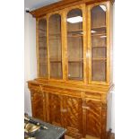 A Victorian satin birch breakfront and inverse breakfront library bookcase, W.170cm D.59cm H.257cm