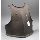 A heavy iron cavalry trooper's breastplate, 17th century, struck twice with maker's marks, musket