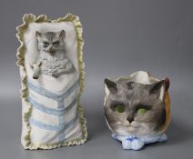 Two 19th century German coloured bisque novelty ornaments, one a night light modelled with cats, dog