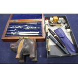 A wooden cased technical drawing set, signed Elliott, four pens, a desk seal and sundries