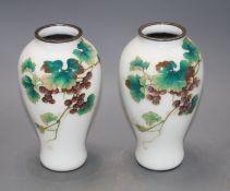 A pair of Japanese cloisonne silver wire vases, decorated with grapes on a white ground, height 18.