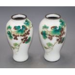 A pair of Japanese cloisonne silver wire vases, decorated with grapes on a white ground, height 18.