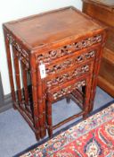 A nest of four 19th century Chinese carved pierced hardwood tables, W.50cm D.36cm H.71cm
