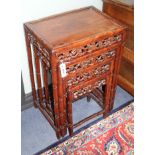 A nest of four 19th century Chinese carved pierced hardwood tables, W.50cm D.36cm H.71cm