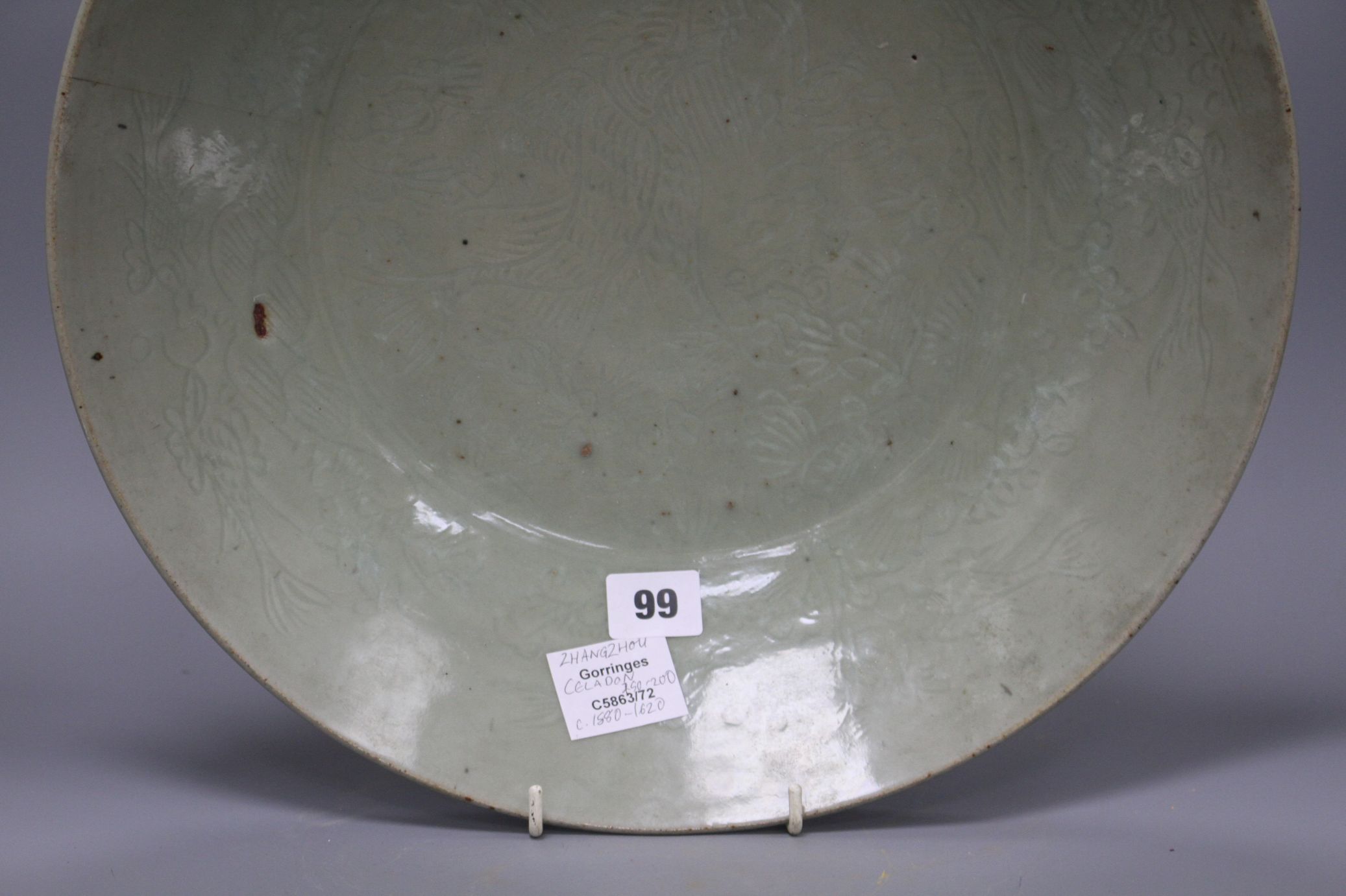 A Chinese Ming celadon dish, Zhangzhou kilns, c.1580-1620, incised with fish and water plants, - Image 4 of 5