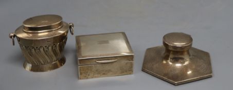 An Edwardian silver tea caddy, Walker & Hall, Sheffield, 1907, a later silver cigarette box and