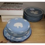 A Wedgwood tri-coloured Jasperware Christmas Anniversary plate and a collection of Christmas and