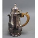 A George V silver baluster chocolate pot, by Searle & Co, London, 1930, 22.8cm, gross 20 oz.
