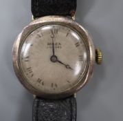 A gentleman's late 1930's silver Rolex Unicorn manual wind wrist watch, on associated leather