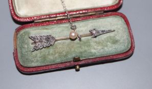 A Victorian yellow metal, rose cut diamond and pearl set arrow brooch, 45mm, gross 2.4 grams, in