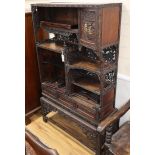 A Japanese carved open cabinet, W.94cm, D.38cm, H.150cm