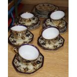 A Noritake porcelain part tea setCONDITION: Two of the tea cups have one hairline crack, another has