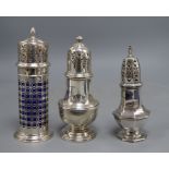 A late Victorian silver lighthouse sugar caster, with blue glass liner, London, 1900, 18.8cm and two