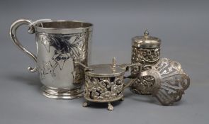 A Victorian silver christening mug, decorated with holly, Edward Ker Reid, London, 1864, 9cm, an
