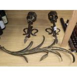A pair of Gothic-style wall brackets and a cast iron palm frond, longest 60cm