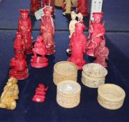 A group of Chinese ivory chess pieces and Canton ivory containers, 19th century largest 10cm