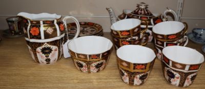 A Royal Crown Derby six-place tea service, Imari pattern no. 1128, comprising London-shape teapot