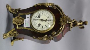 A Louis XVI style tortoiseshell and ormolu mantel clock height 37cm