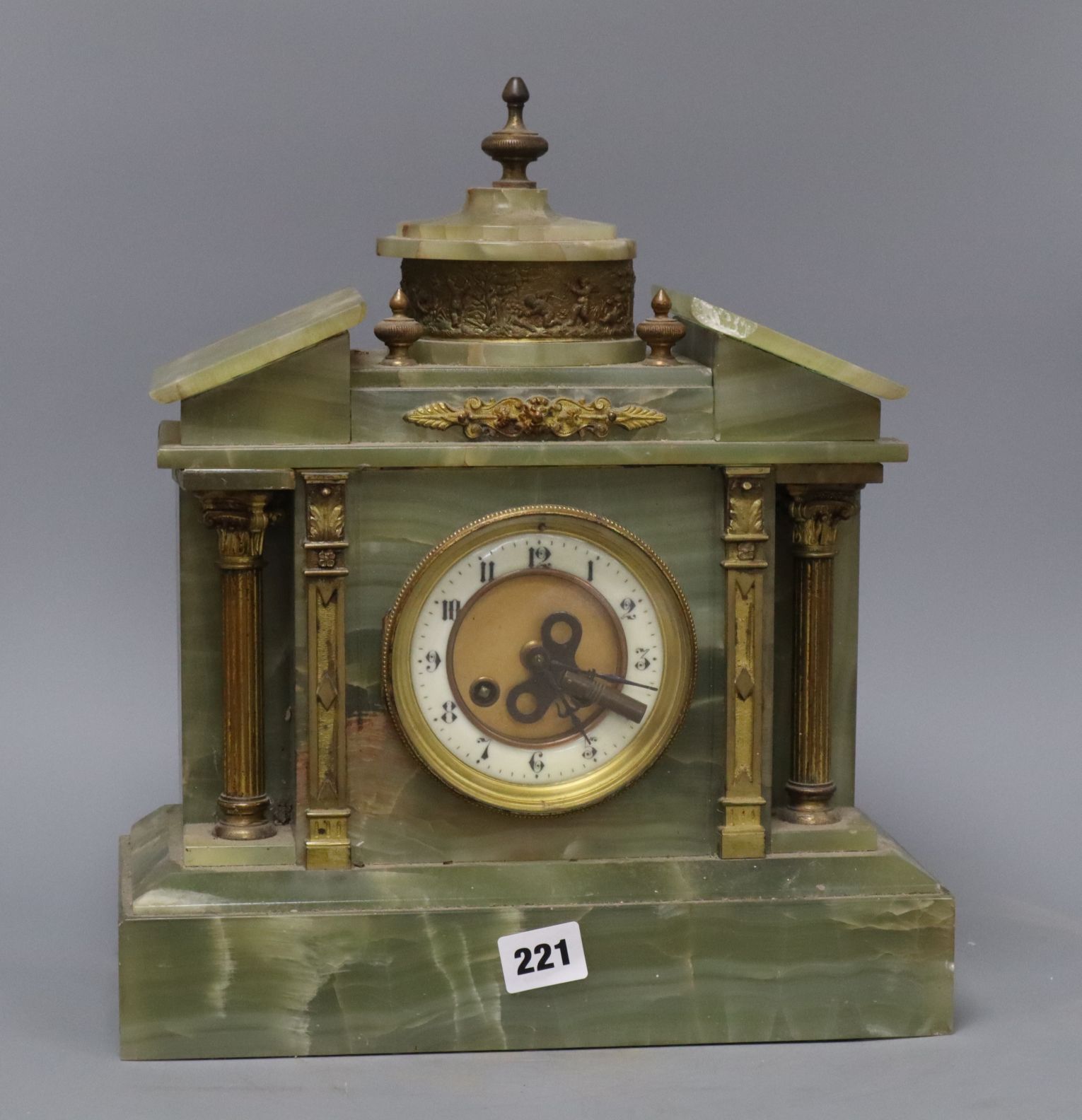 A French green onyx mantel clock, height 36cm