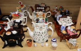 A collection of thirteen Portmeirion and Cardew novelty teapots, including dresser, sewing machine