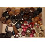 A collection of 19th century ivory, bone and treen etc. dice shakers and containers, many with