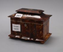A Georgian tortoiseshell tea caddy, height 13cmCONDITION: The lid has detached from the back